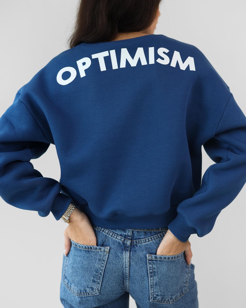 Світшот з написом "Optimism" від FASHIONISTA синій
