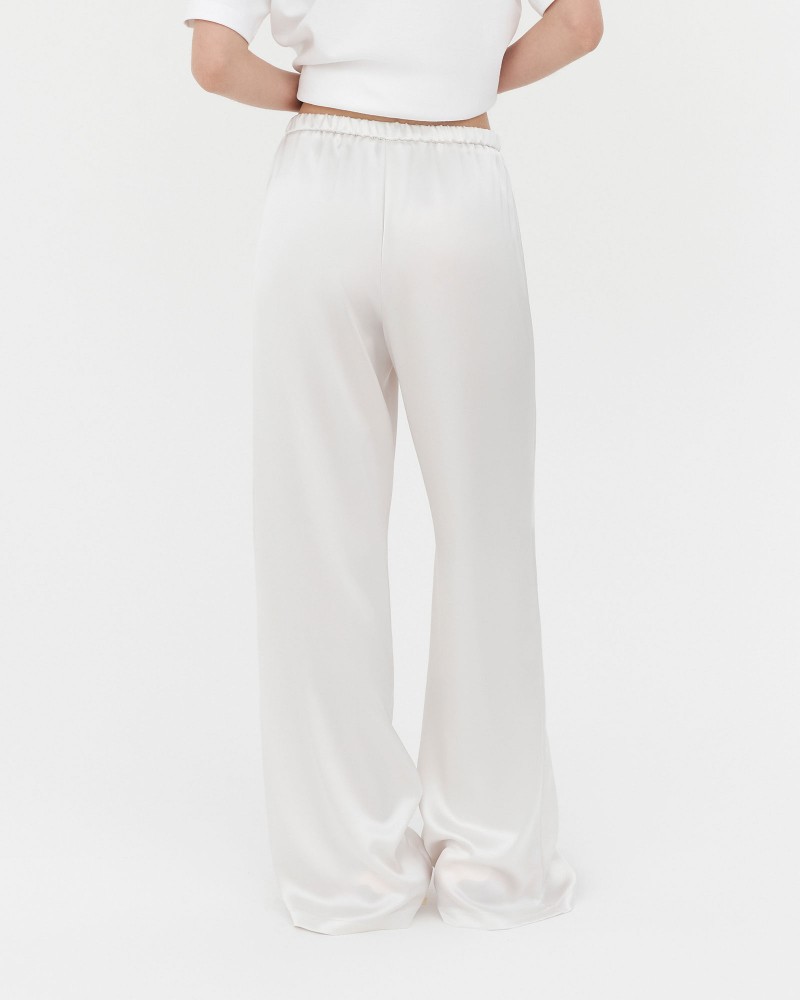 Штани сатинові з еластичним поясом від FASHIONISTA молочний Штани сатинові з еластичним поясом від FASHIONISTA молочний