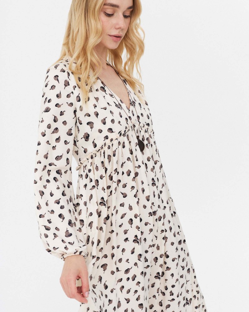 Сукня з абстрактним принтом та V-вирізом від FASHIONISTA молочний Сукня з абстрактним принтом та V-вирізом від FASHIONISTA молочний