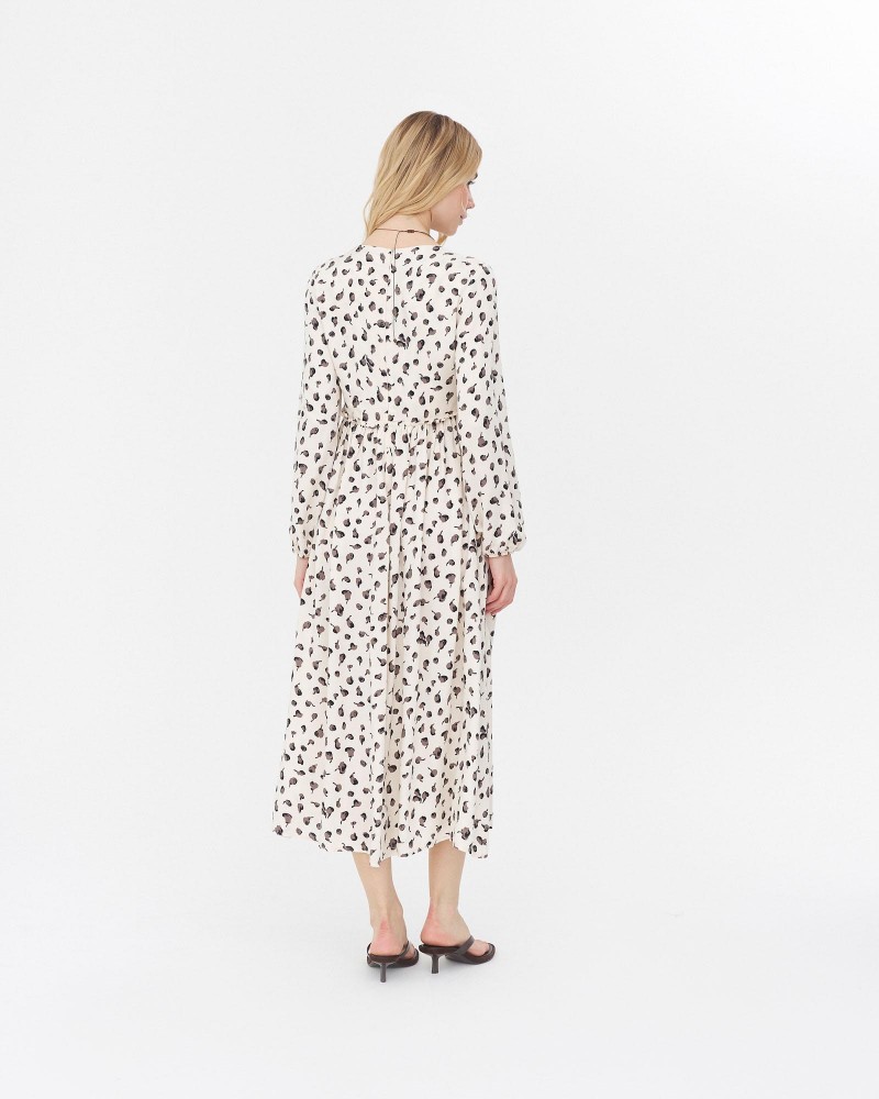 Сукня з абстрактним принтом та V-вирізом від FASHIONISTA молочний Сукня з абстрактним принтом та V-вирізом від FASHIONISTA молочний