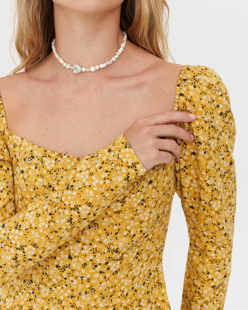 Сукня з квітковим принтом від FASHIONISTA жовтий Сукня з квітковим принтом від FASHIONISTA жовтий