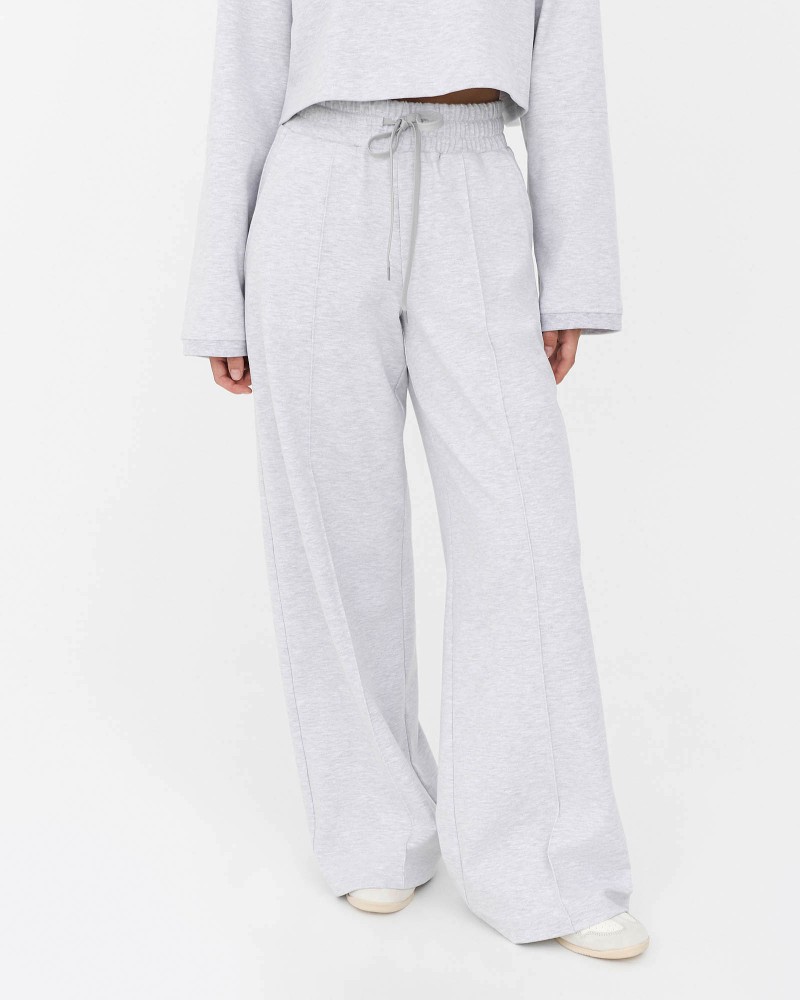 Сірі трикотажні штани-палацо з декоративними швами спереду FASHIONISTA