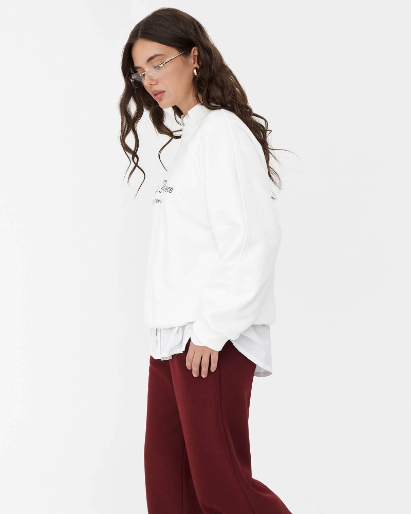 Білий світшот з написом FASHIONISTA