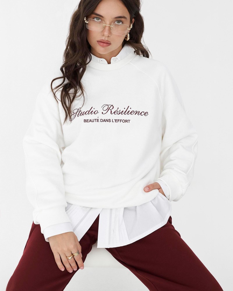 Білий світшот з написом FASHIONISTA