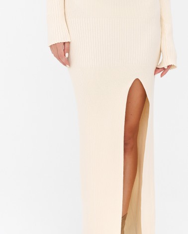 Кремовий трикотажна сукня з розрізом FASHIONSTA