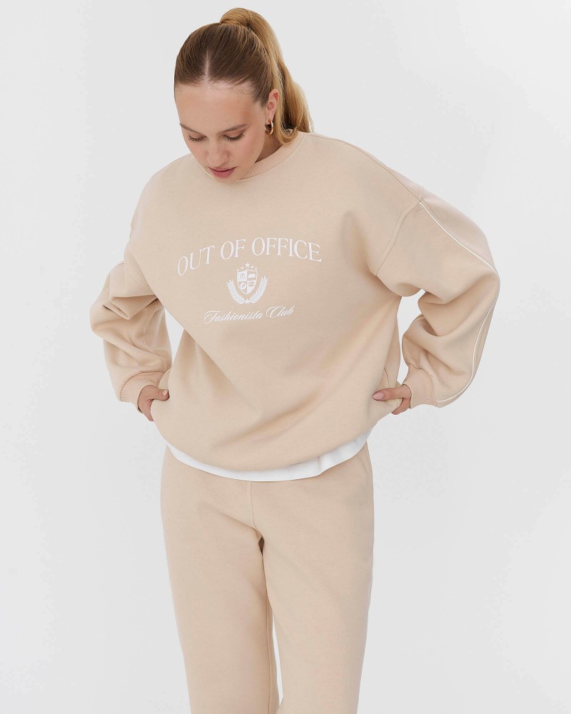 Світло-бежевий базовий світшот на флісі з принтом FASHIONISTA Світло-бежевий базовий світшот на флісі з принтом FASHIONISTA