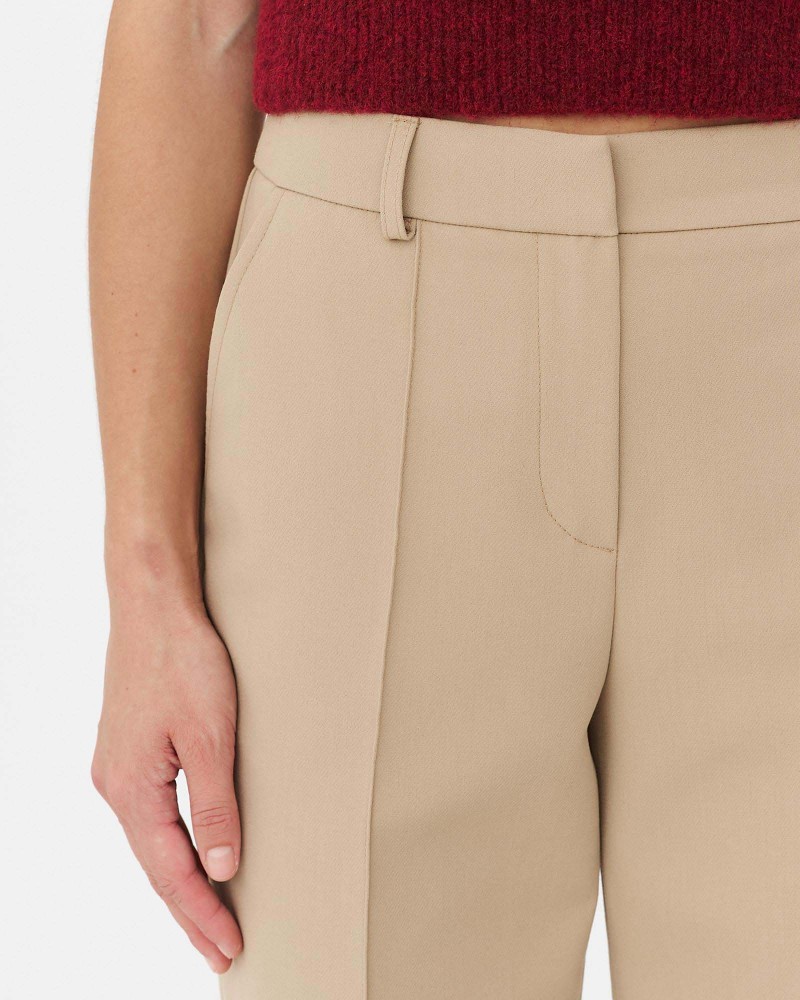 Бежеві штани прямого крою з декоративними швами FASHIONISTA