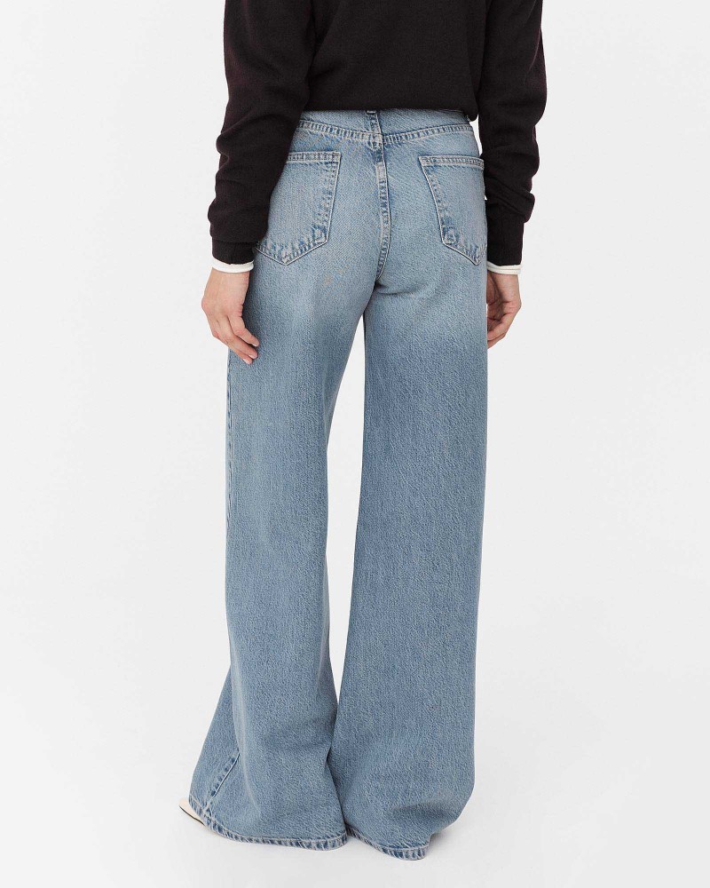 Блакитні джинси з широкими штанинами та потертостями FASHIONISTA