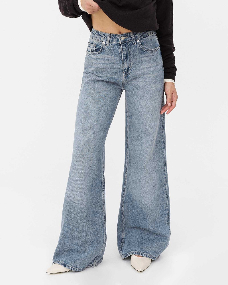 Блакитні джинси з широкими штанинами та потертостями FASHIONISTA