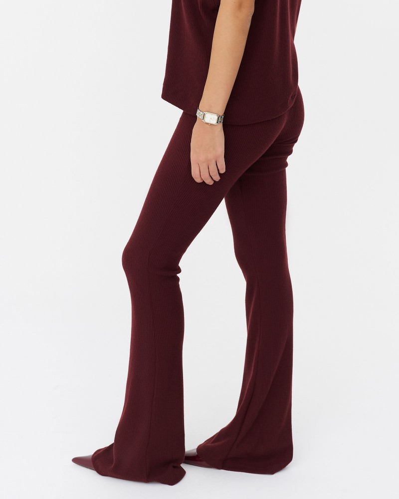 Бордові трикотажні штани-кльош текстуровані FASHIONISTA Бордові трикотажні штани-кльош текстуровані FASHIONISTA