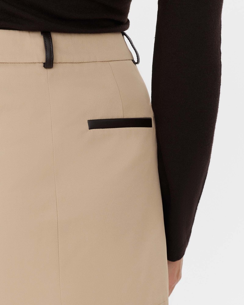 Бежева мініспідниця з вставками зі штучної шкіри FASHIONISTA