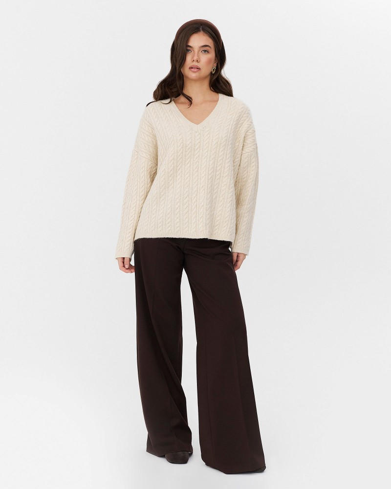 Молочний пуловер з комбінованою в'язкою FASHIONISTA