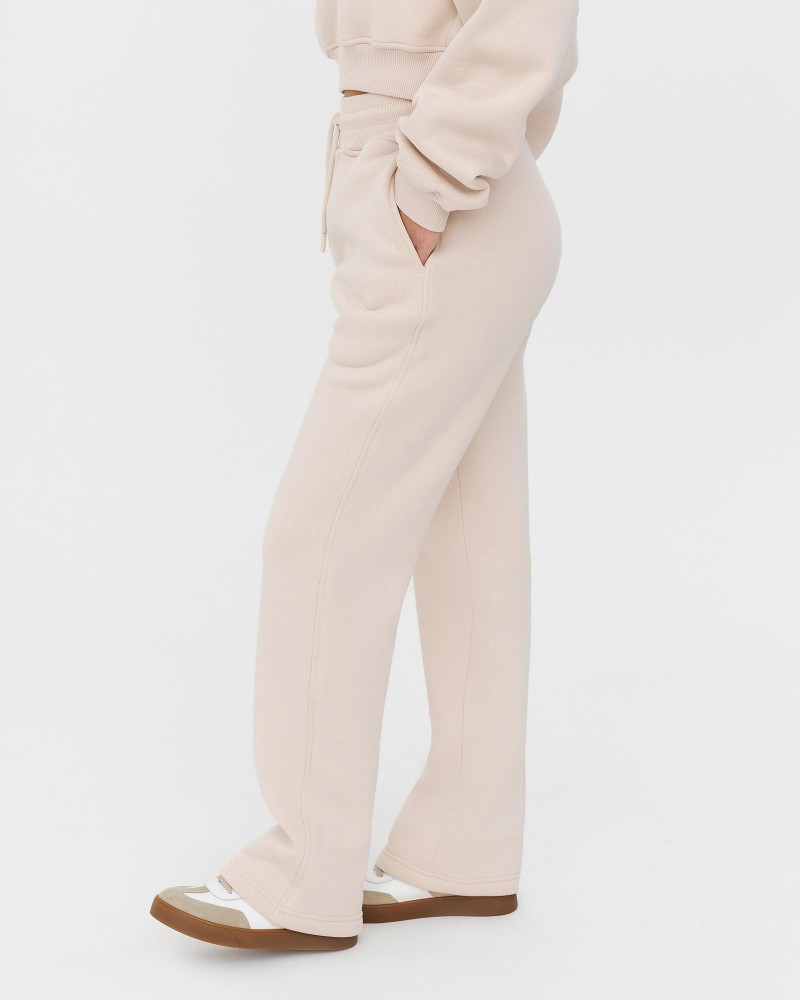 Бежеві трикотажні штани прямого крою з флісом FASHIONISTA