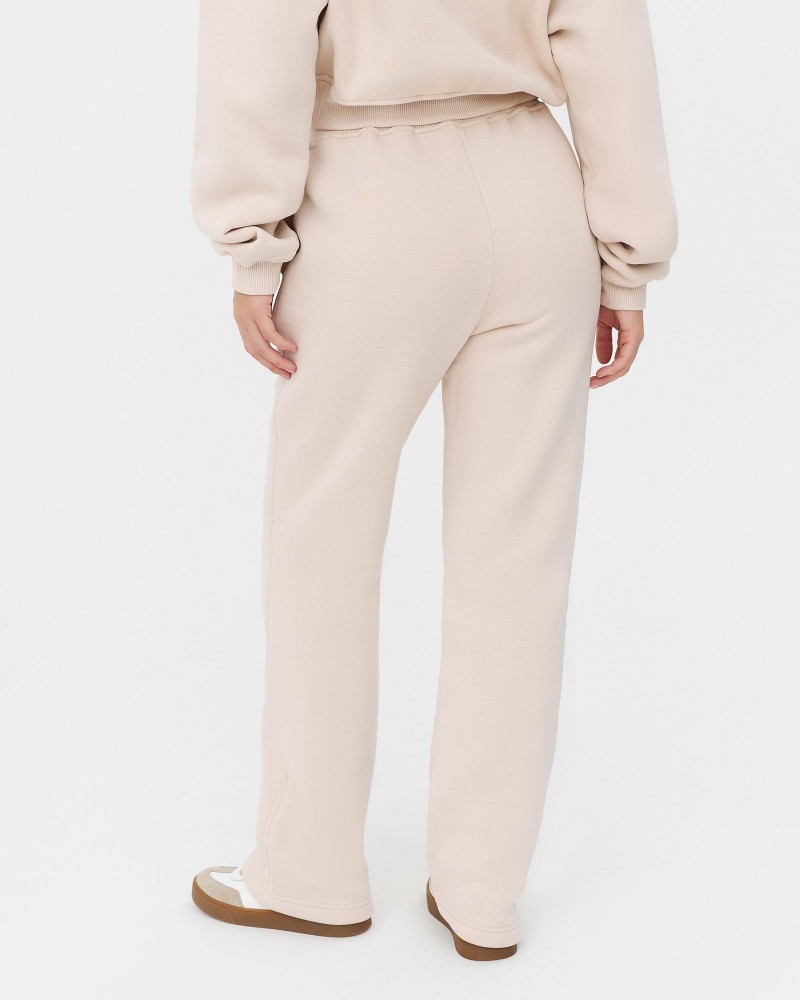 Бежеві трикотажні штани прямого крою з флісом FASHIONISTA