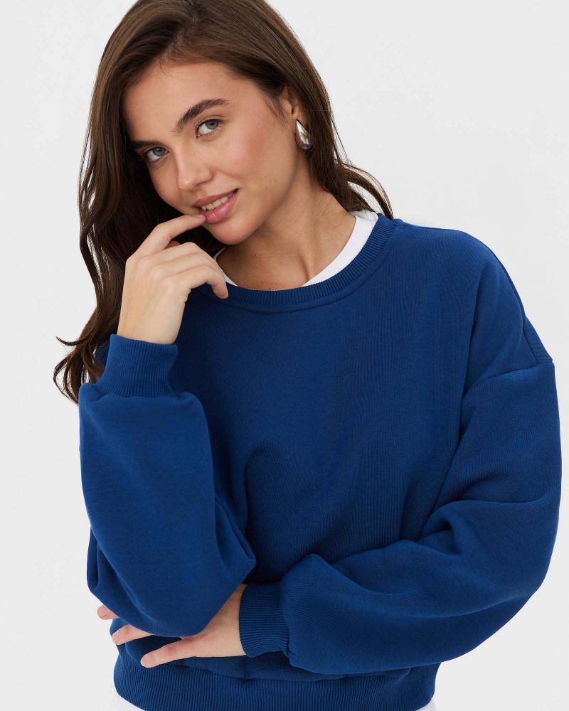 Світшот з написом "Optimism" від FASHIONISTA синій