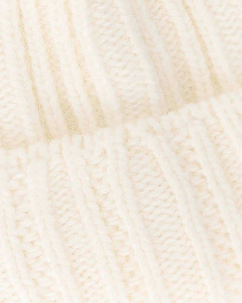 Молочна в'язана шапка із закотом FASHIONISTA