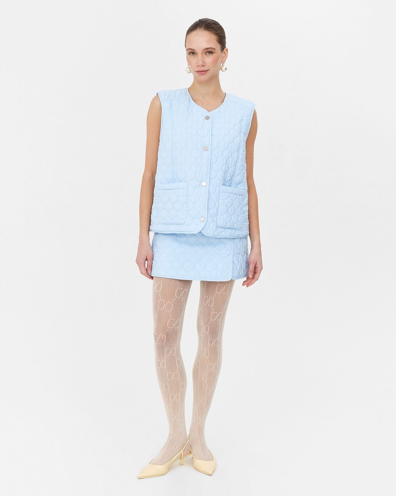 Блакитний стьобаний жилет з кишенями FASHIONISTA Блакитний стьобаний жилет з кишенями FASHIONISTA