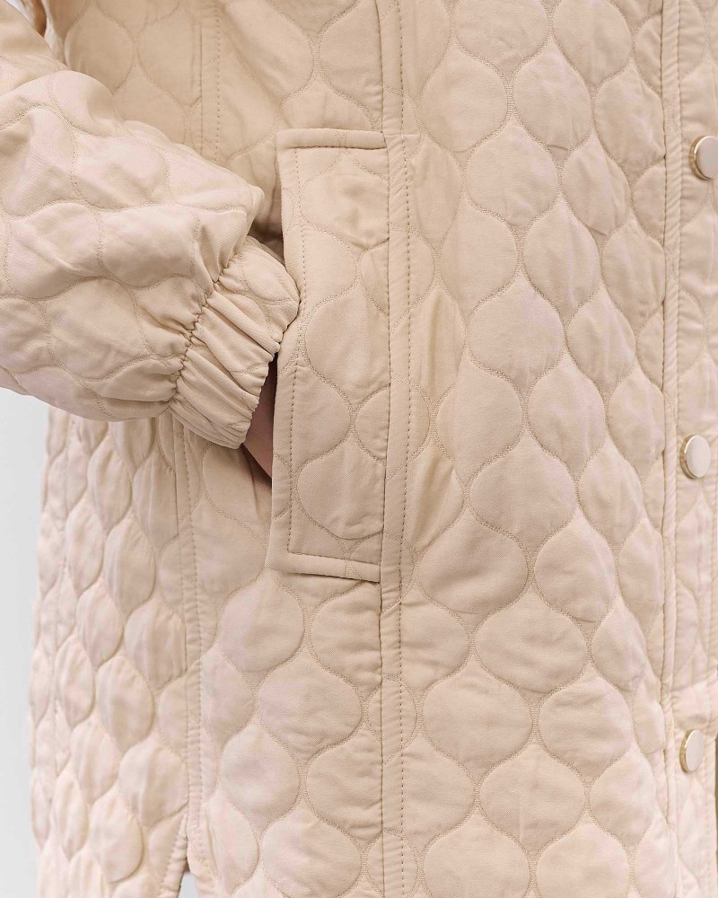 Світло-бежева стьобана сорочка Bubble з поясом FASHIONISTA