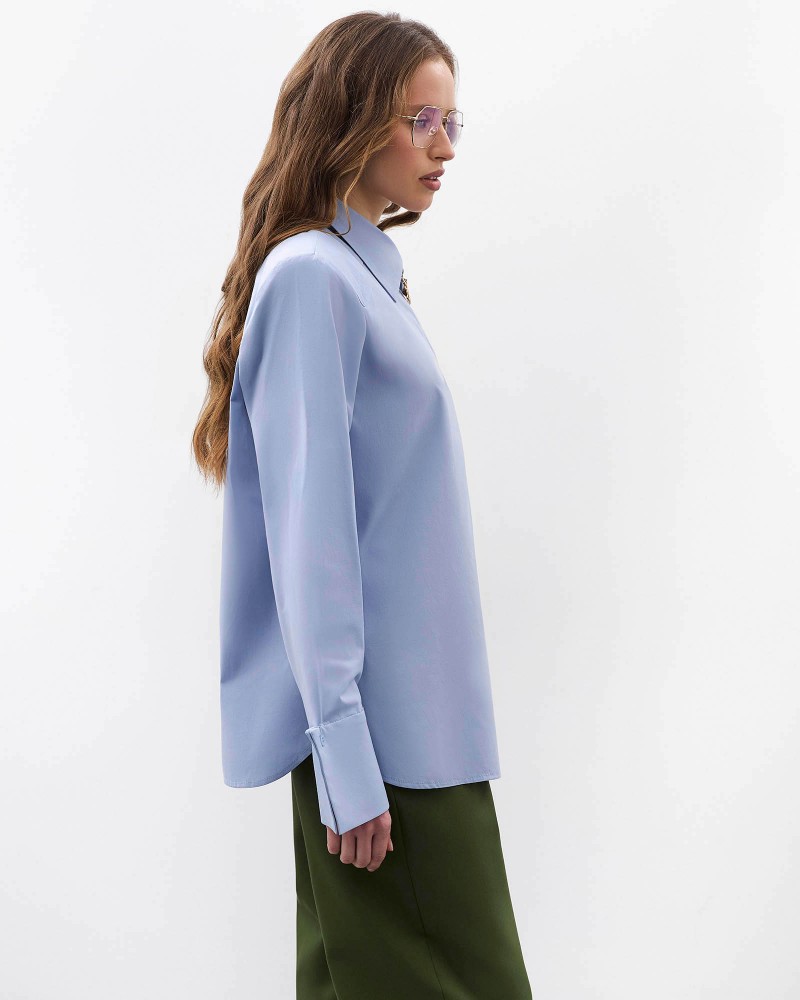 Блакитна сорочка з широкими манжетами та поясом FASHIONISTA