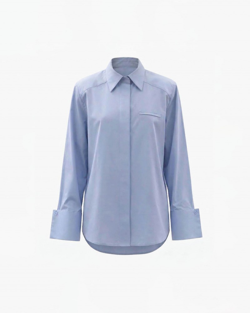 Блакитна сорочка з широкими манжетами та поясом FASHIONISTA