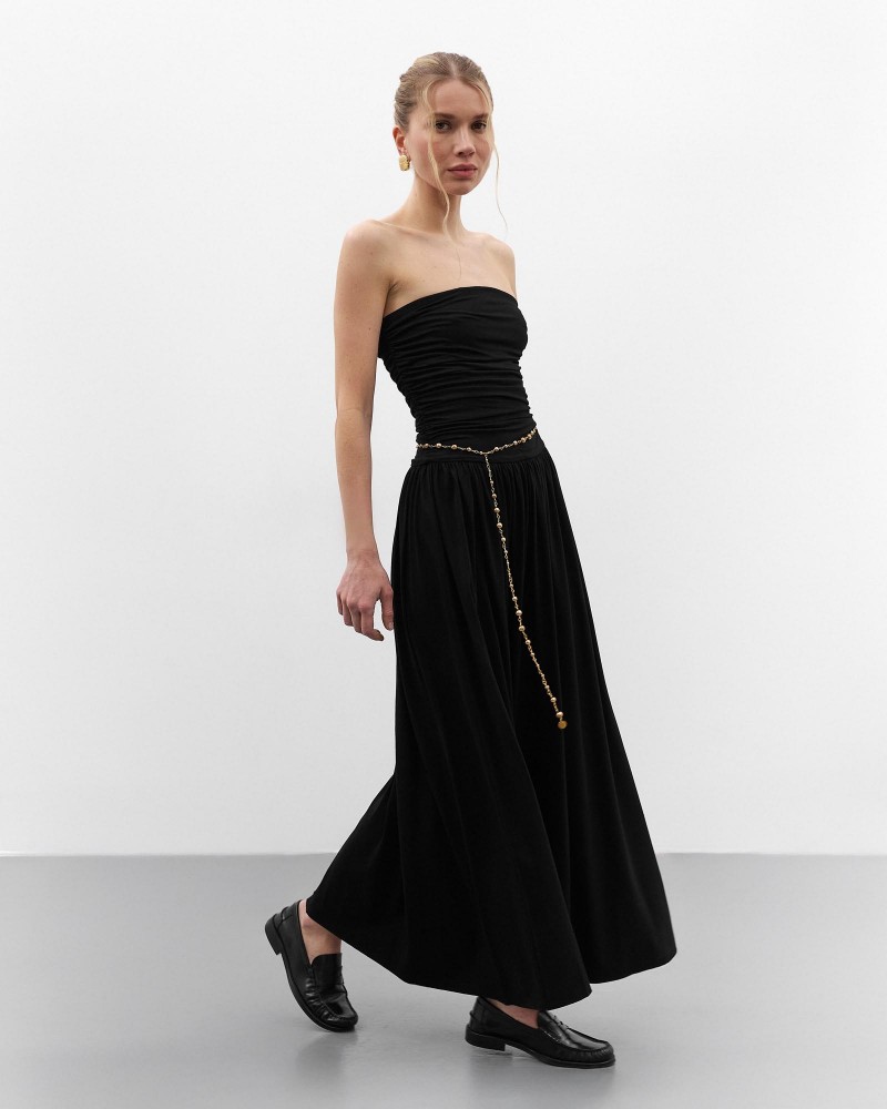 Чорна максісукня з драпіруванням
 FASHIONSTA