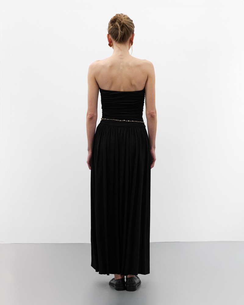 Чорна максісукня з драпіруванням
 FASHIONSTA