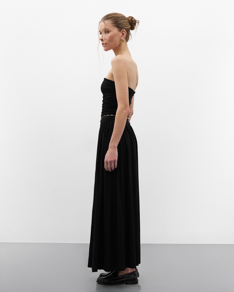 Чорна максісукня з драпіруванням
 FASHIONSTA