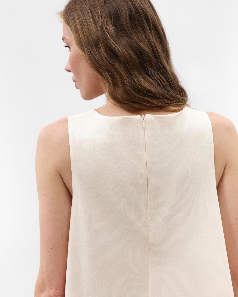 Світло-бежева мінісукня вільного крою
 FASHIONSTA