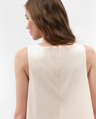 Світло-бежева мінісукня вільного крою
 FASHIONSTA