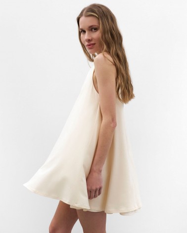 Світло-бежева мінісукня вільного крою
 FASHIONSTA