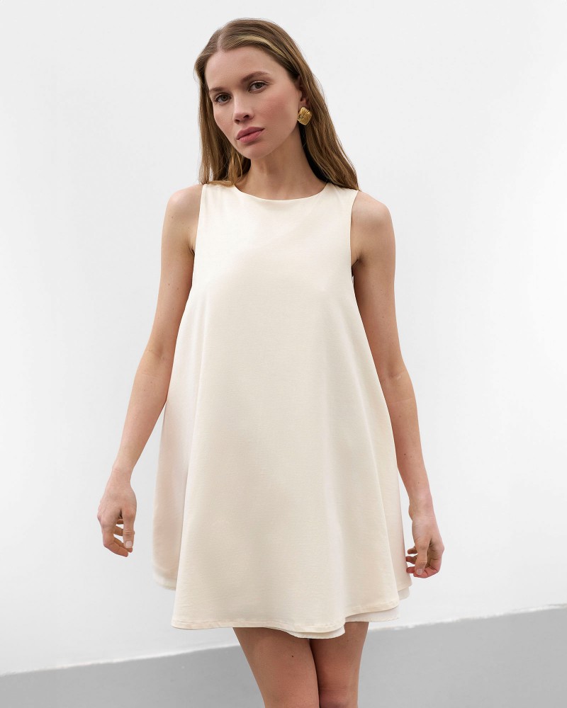 Світло-бежева мінісукня вільного крою
 FASHIONSTA