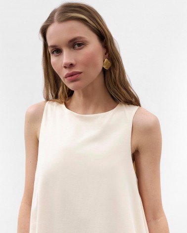 Світло-бежева мінісукня вільного крою
 FASHIONSTA