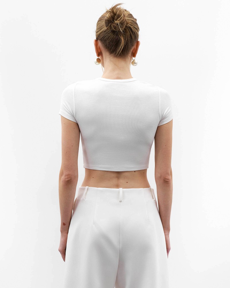 Біла вкорочена футболка FASHIONISTA Біла вкорочена футболка FASHIONISTA